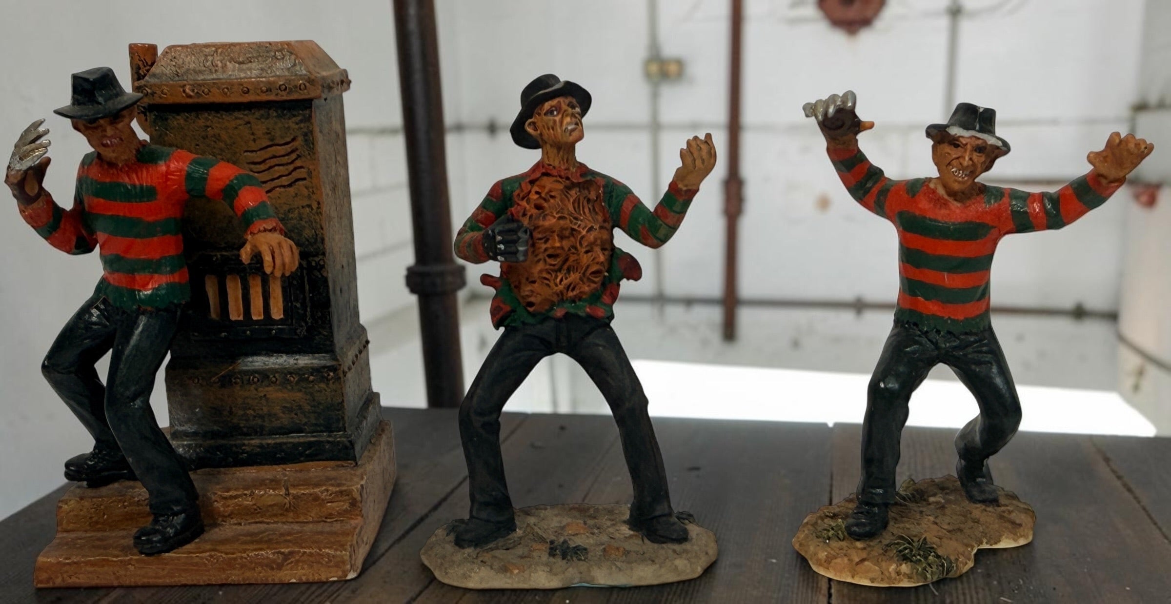 2007 Hawthorne Village Freddy Krueger set of 3 horror figurines from A Nightmare on Elm Street, officially licensed by New Line Productions.