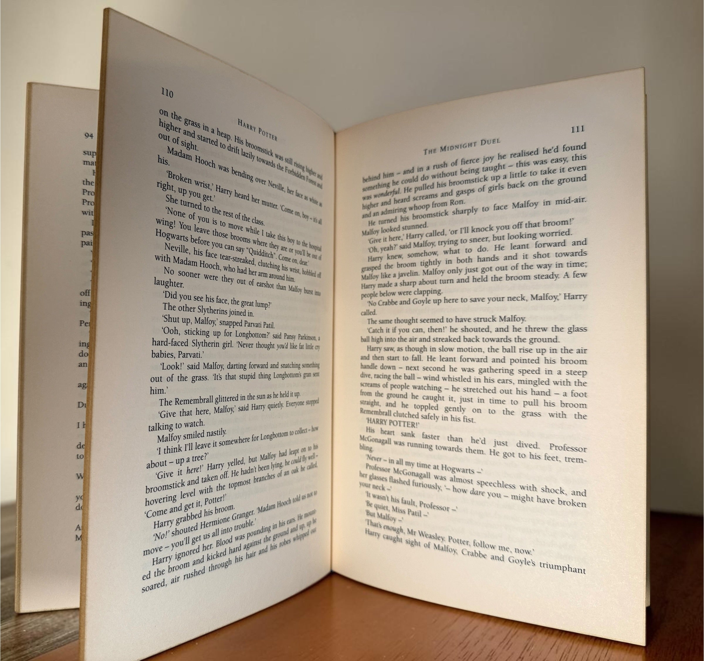 Collectible 1999 Harry Potter Philosopher’s Stone UK deluxe third printing with red cloth binding, gilt page edges and ribbon marker.