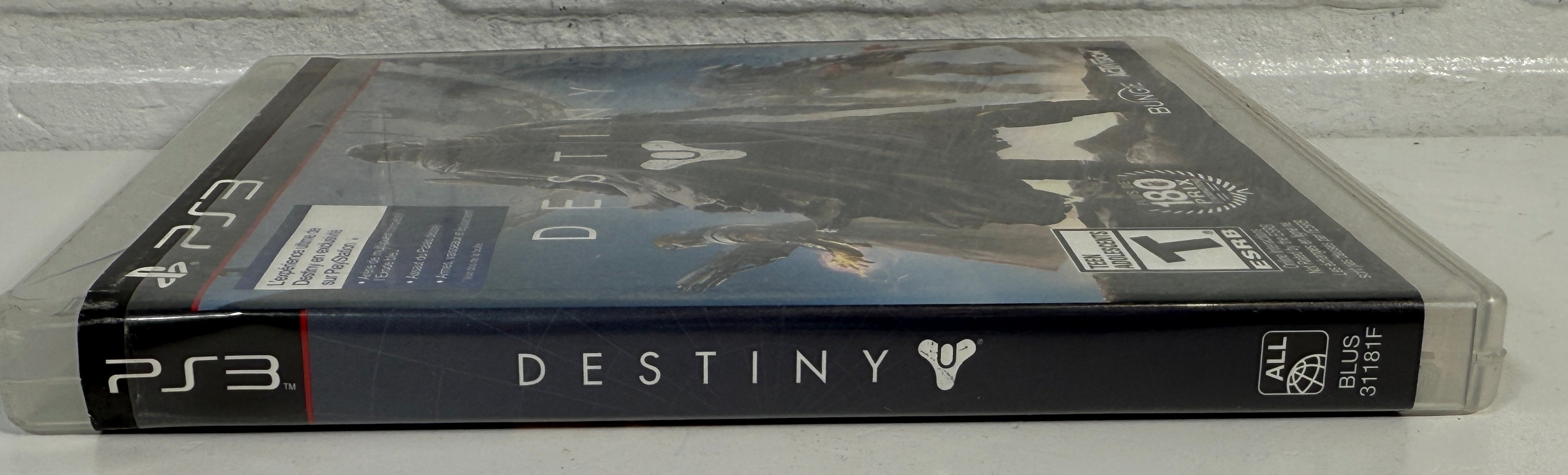 PS3 game case for 'Destiny' on a light gray background