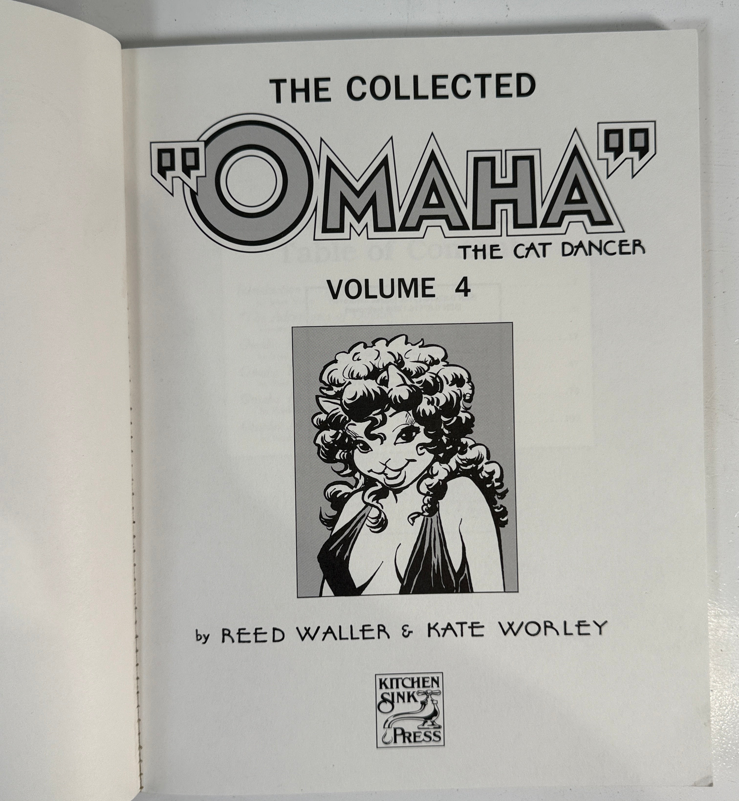 Book titled 'The Collected Omaha: The Cat Dancer' Volume 4 by Reed Waller & Kate Worley on a white background.