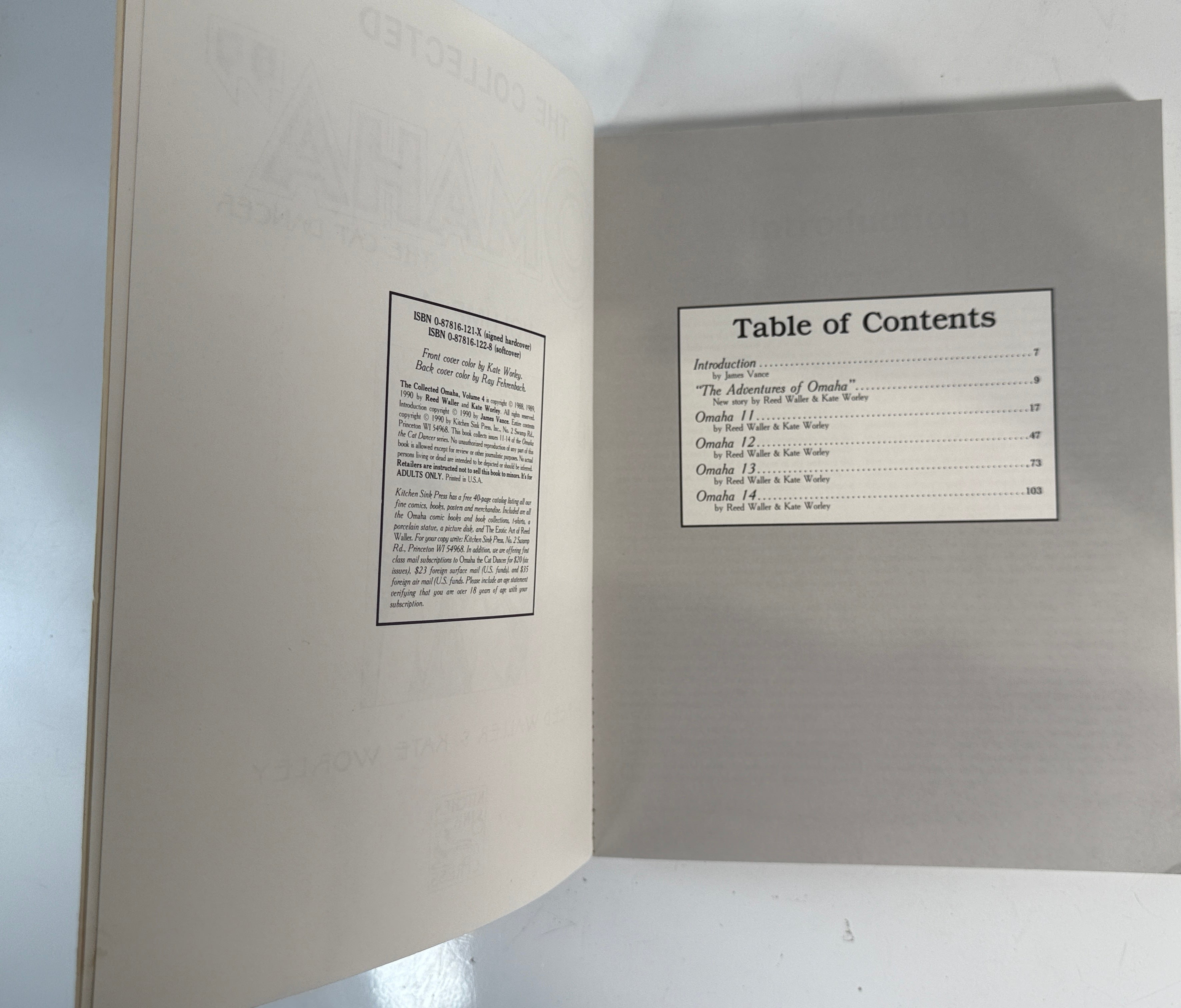 Open book with table of contents on a gray background