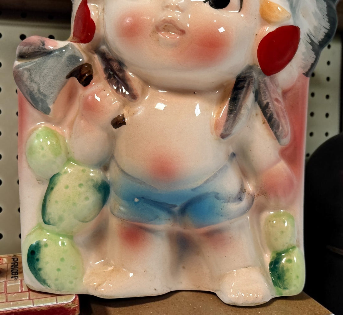 Vintage 1950s Japanese ceramic figural child wall pocket planter with colorful hand-painted decoration, cactus details and original Japan mark.