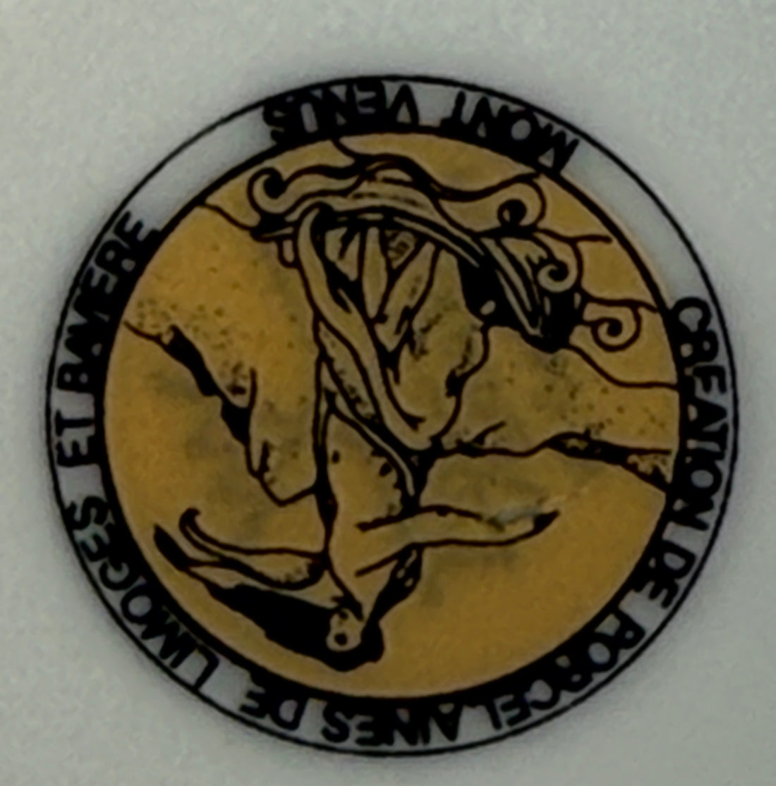 Circular logo with a horse design and text on a white background