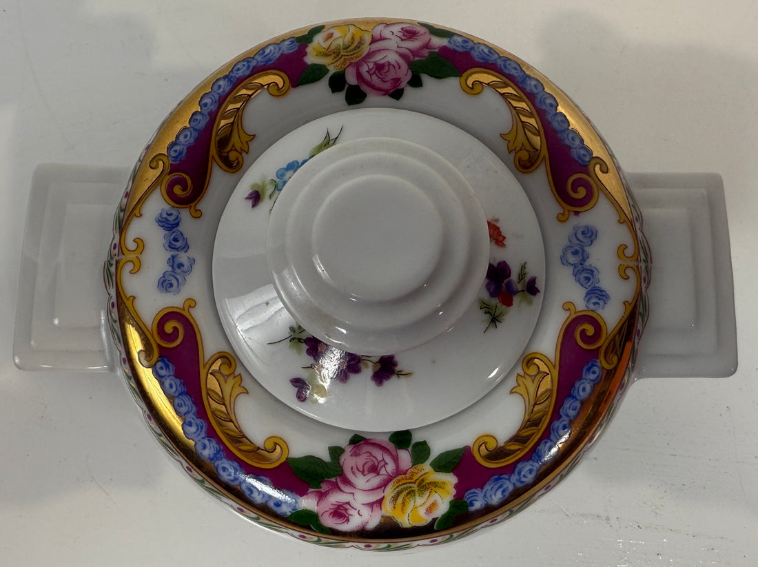 Decorative saucer with floral patterns on a white background