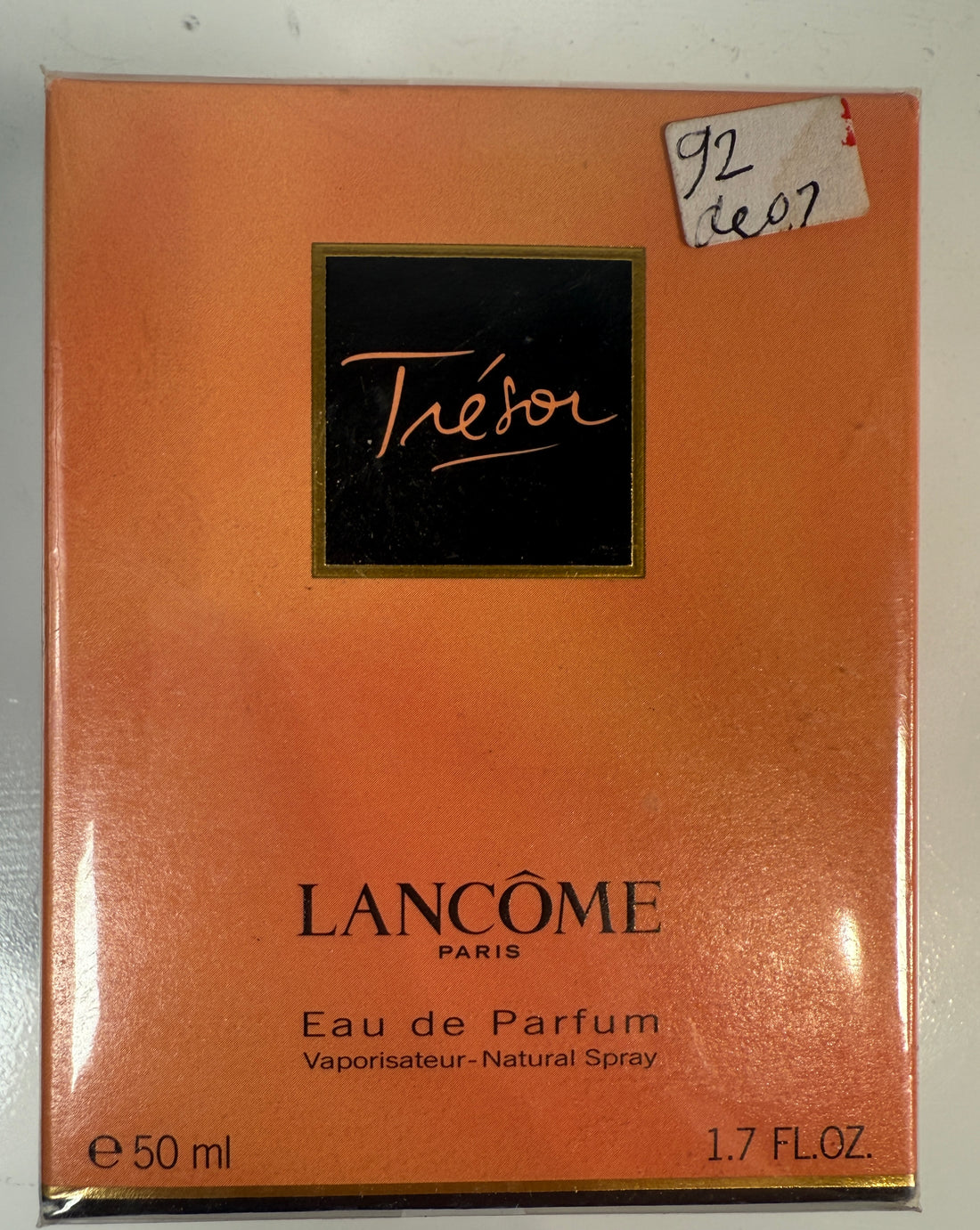 Lancome Tresor Eau de Parfum packaging with a visible price tag.
