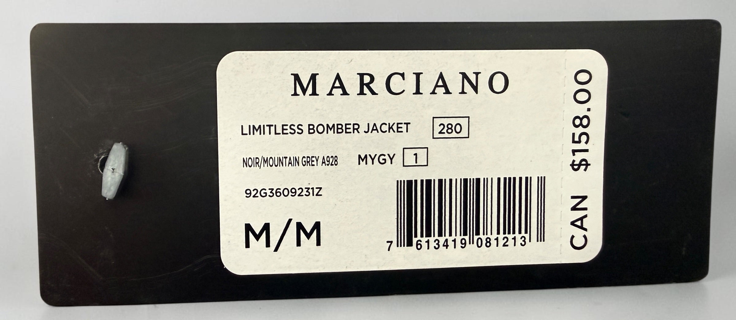 Shop the Marciano Limitless bomber jacket in silver-grey satin, size M. Original tags attached, zip pockets and ribbed trim. Minor marks disclosed.