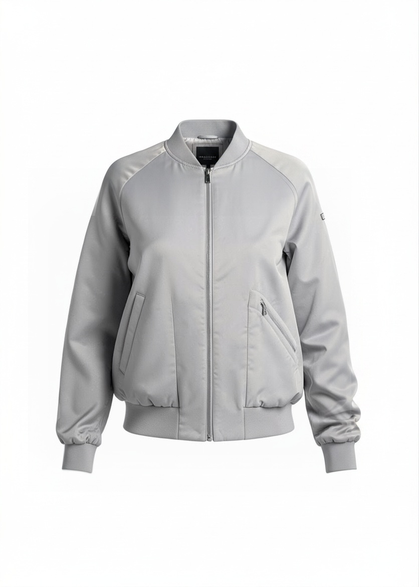 Shop the Marciano Limitless bomber jacket in silver-grey satin, size M. Original tags attached, zip pockets and ribbed trim. Minor marks disclosed.