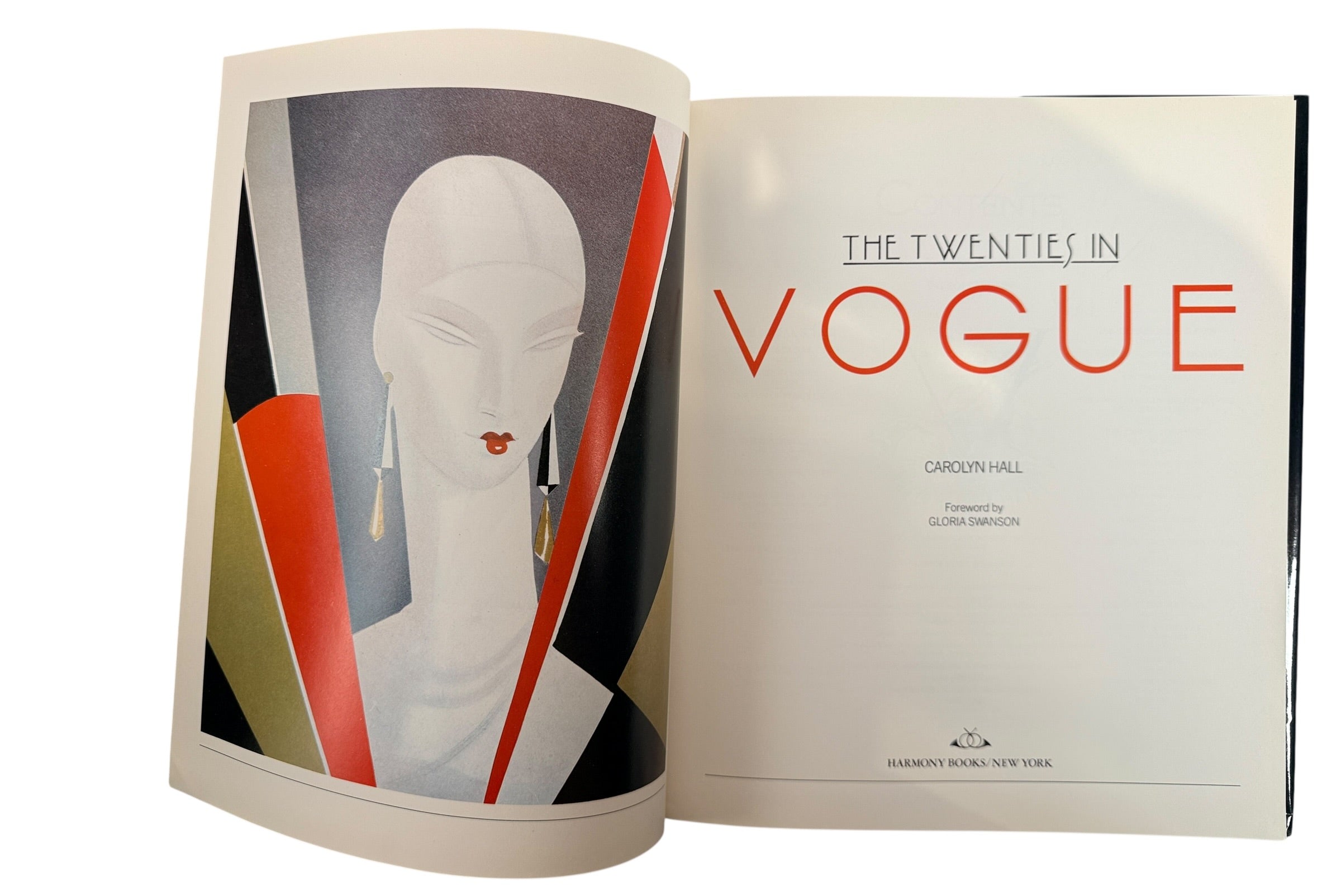 The Twenties in Vogue hardcover fashion history book. Illustrated 1920s style, culture, and Vogue archives. Art Deco era coffee table reference with dust jacket.