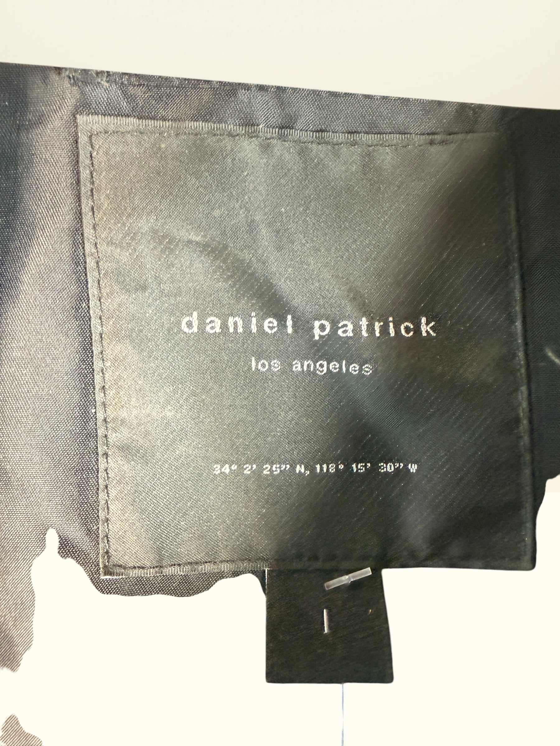 Daniel Patrick Los Angeles oversized black bomber jacket, size L, with orange lining, red embroidered sleeve logo and branded zipper pulls.