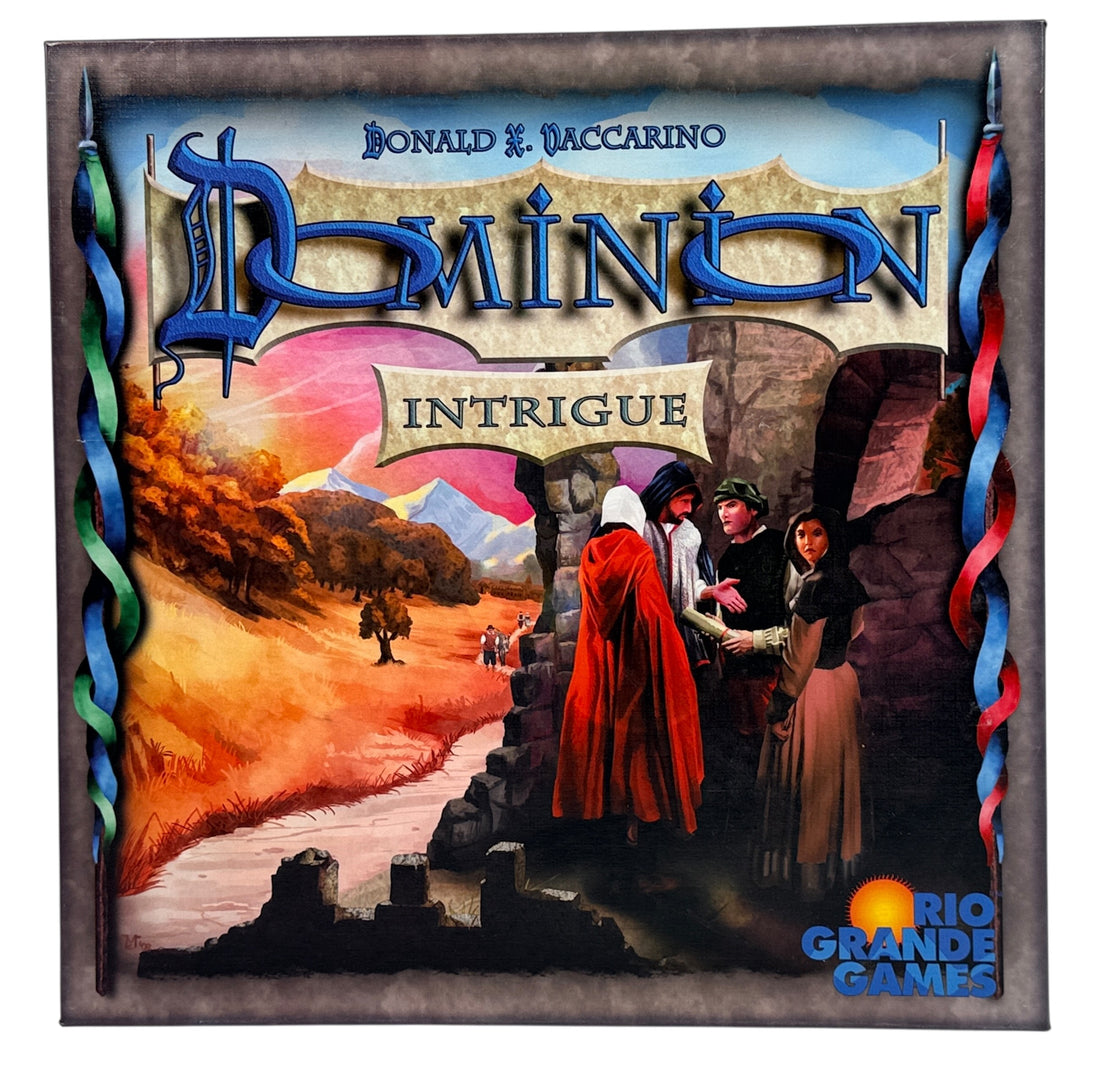 Early 2009 first edition Dominion Intrigue board game expansion. Partial sealed with original box. Classic deck-building strategy by Donald X. Vaccarino.