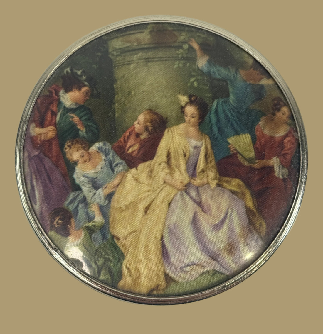 Round decorative item with classical painting of a woman in a crowd on a white background