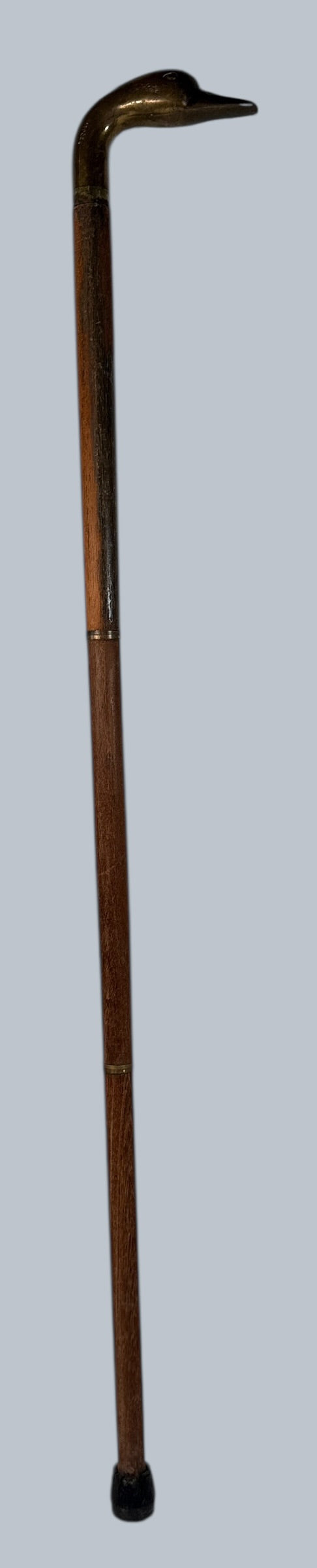 Vintage brass duck head walking cane with 3-piece wooden shaft. Collapsible travel design, aged patina, and classic gentleman’s style.