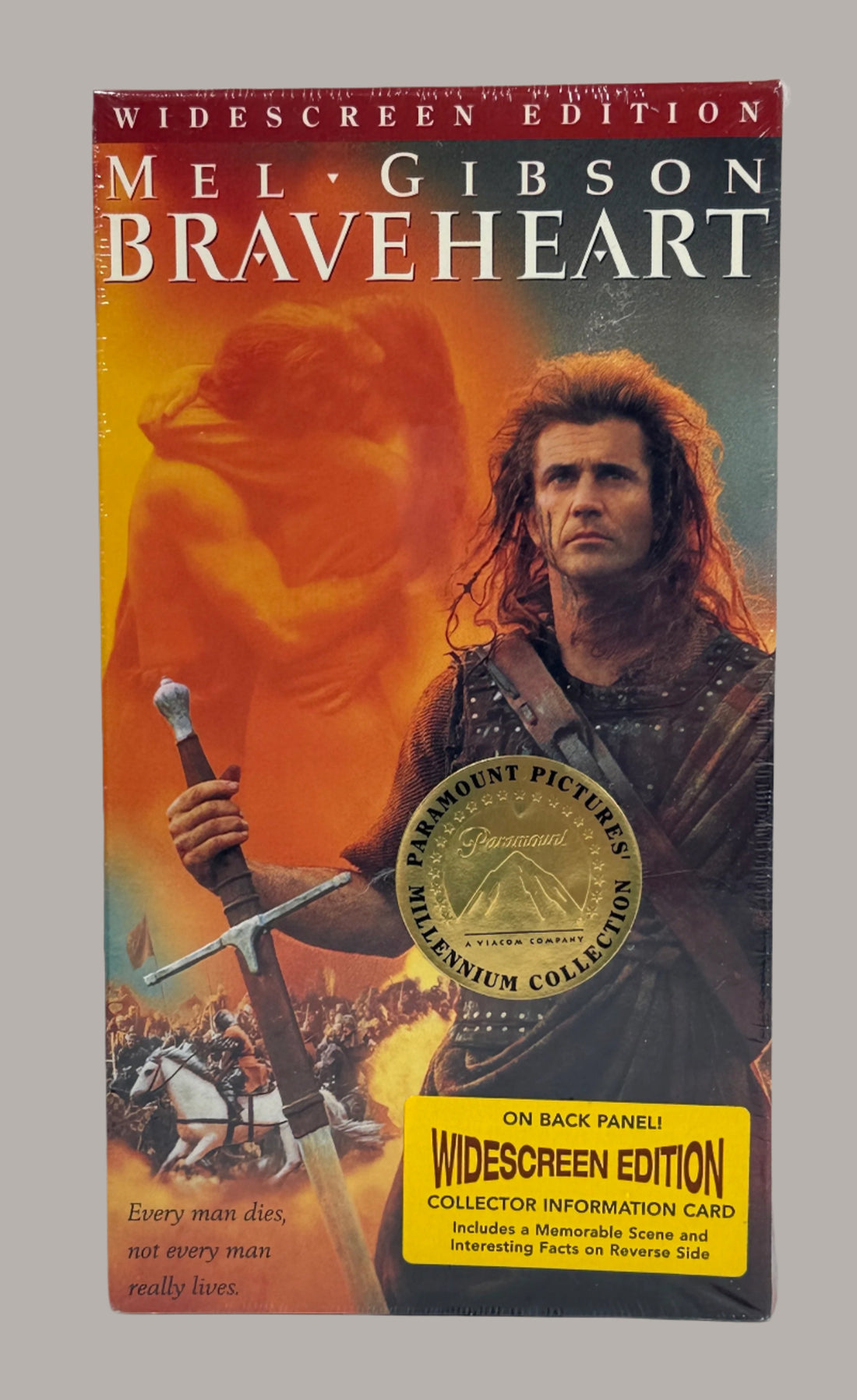 VHS cover of 'Braveheart' with Mel Gibson holding a sword against a brick wall.