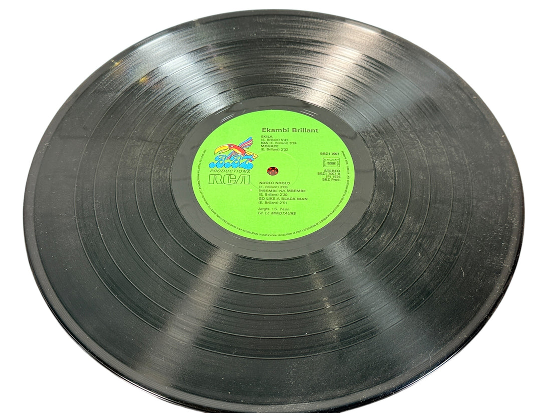 Original 1976 Afro-funk LP by Ekambi Brillant. Nayô-Nayô French pressing on BBZ/RCA. VG vinyl, iconic African funk classic.