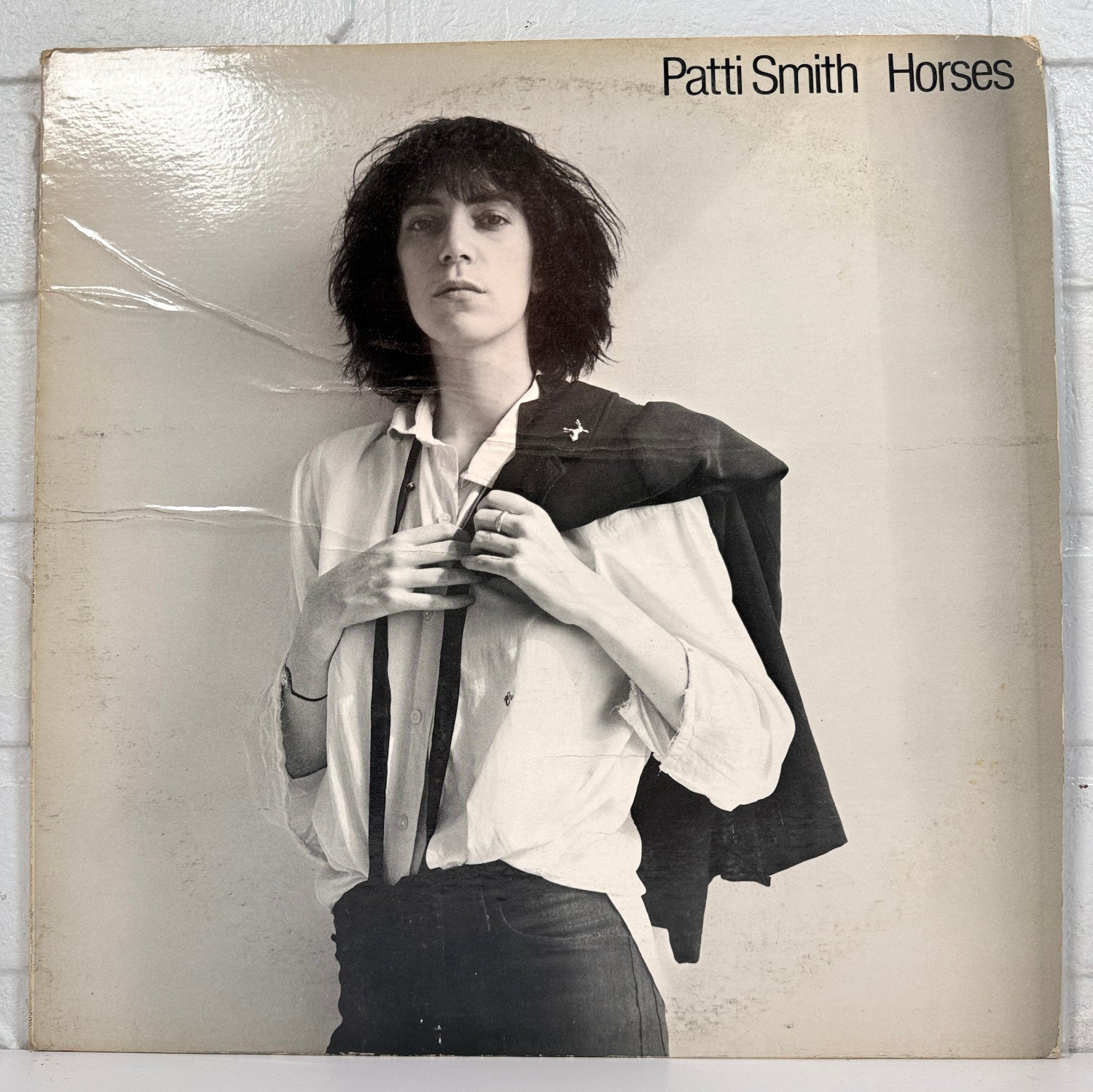 Original 1975 Patti Smith Horses LP on Arista. VG vinyl with worn sleeve. Punk and art-rock classic, priced for listening collectors and fans.