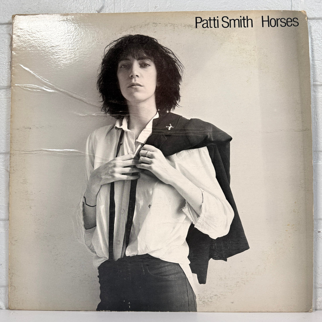 Original 1975 Patti Smith Horses LP on Arista. VG vinyl with worn sleeve. Punk and art-rock classic, priced for listening collectors and fans.