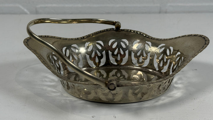 Antique Birmingham sterling silver pierced bonbon basket, c.1900s, 70g. Edwardian English silver, elegant openwork design, collectible centerpiece.
