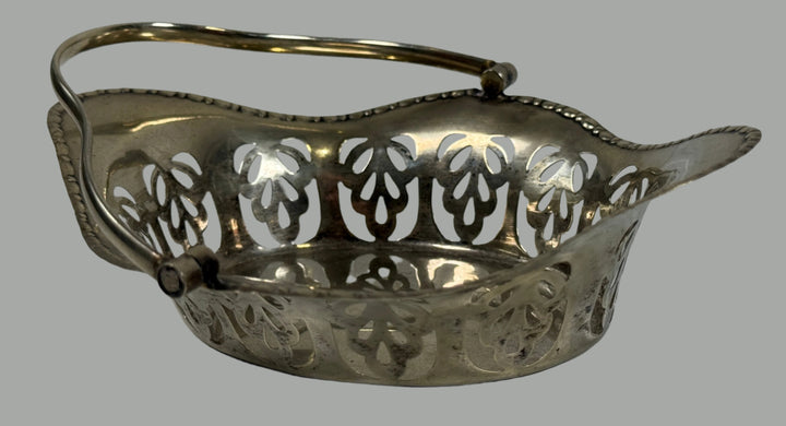 Antique Birmingham sterling silver pierced bonbon basket, c.1900s, 70g. Edwardian English silver, elegant openwork design, collectible centerpiece.