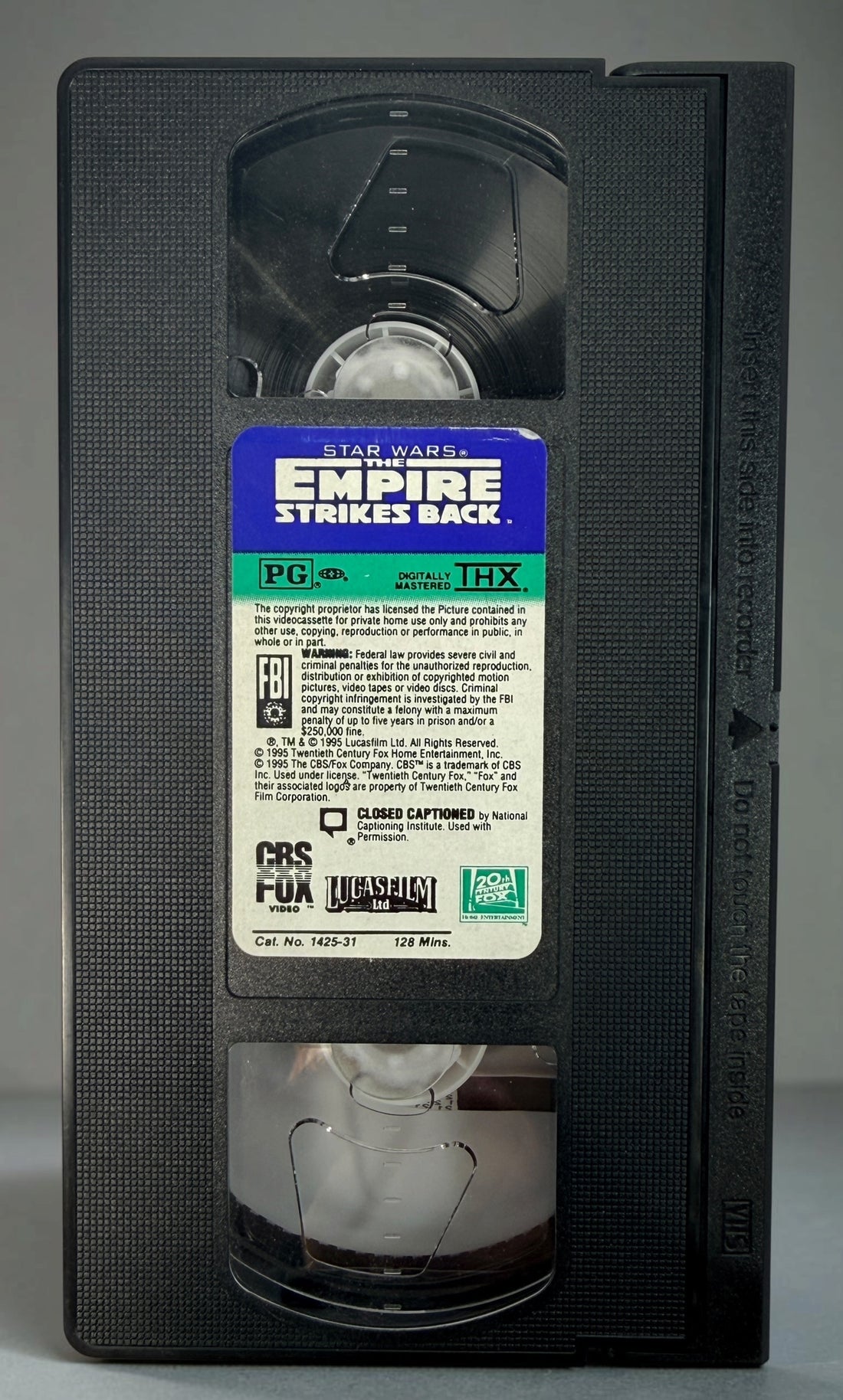 1995 Star Wars The Empire Strikes Back VHS, THX Digitally Mastered CBS/Fox release with original Stormtrooper slipcase. Vintage Star Wars collectible.