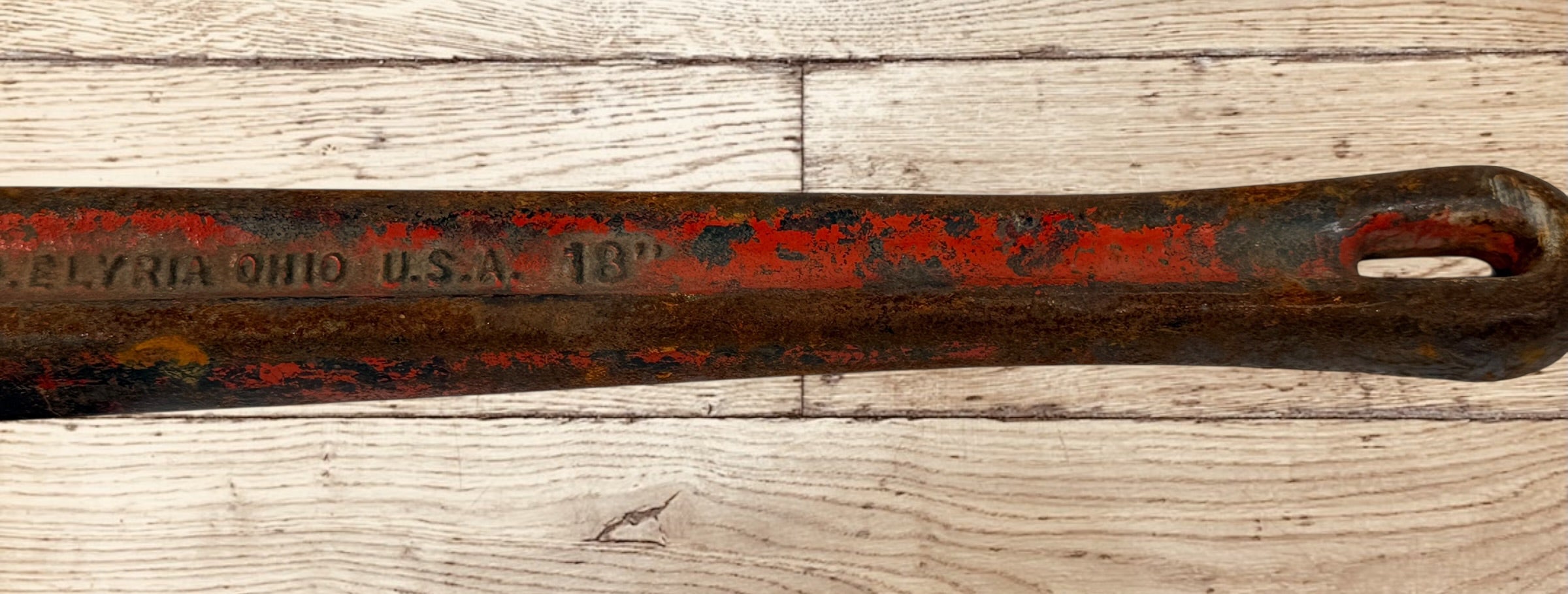 Vintage RIDGID 14 inch pipe wrench made in Elyria Ohio USA. Early industrial hand tool with original patina, ideal for collectors or workshop decor.