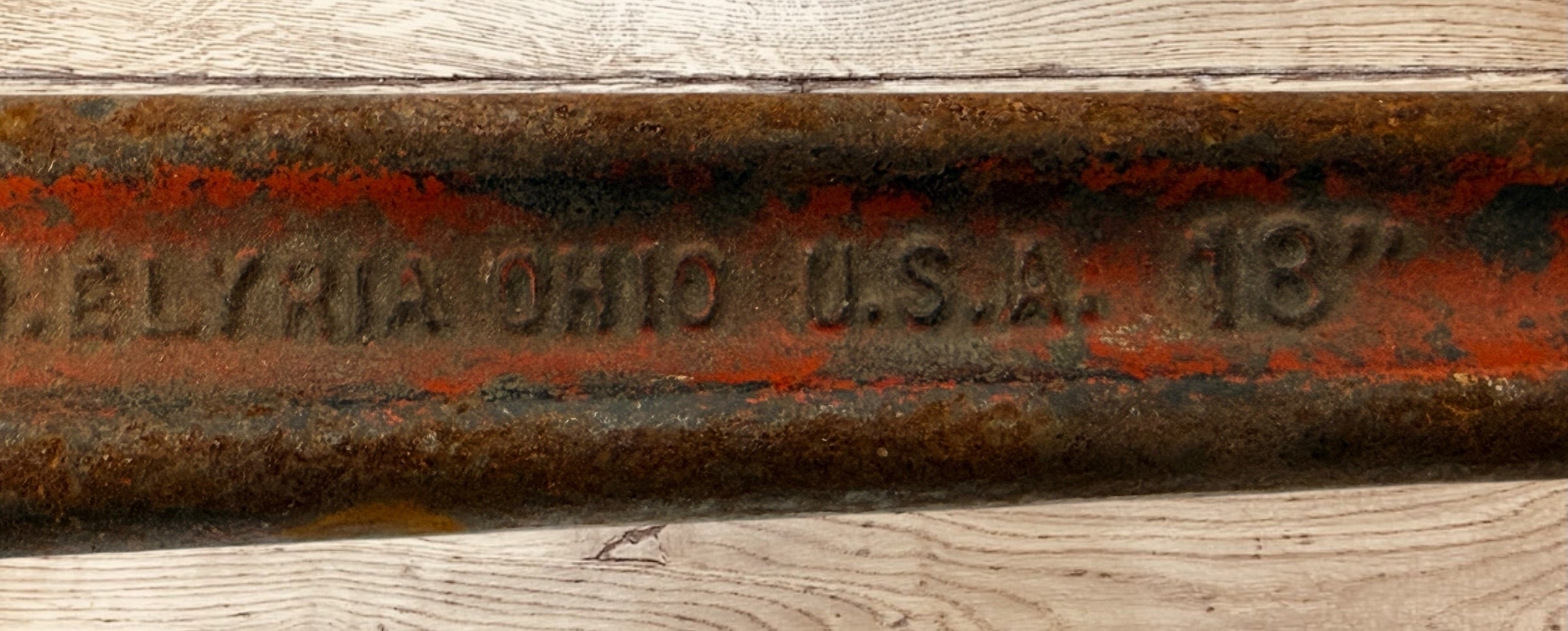 Vintage RIDGID 14 inch pipe wrench made in Elyria Ohio USA. Early industrial hand tool with original patina, ideal for collectors or workshop decor.