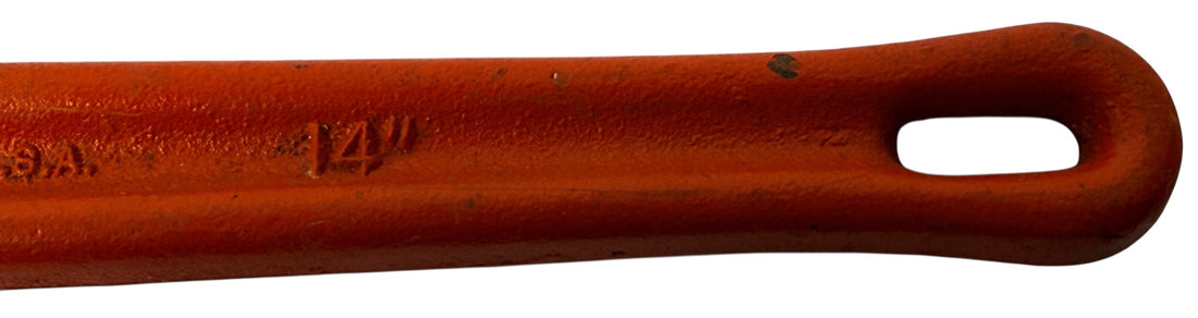 Vintage RIDGID 14 inch pipe wrench made in Elyria, Ohio USA. Heavy duty professional plumbing tool with classic industrial look and solid function.