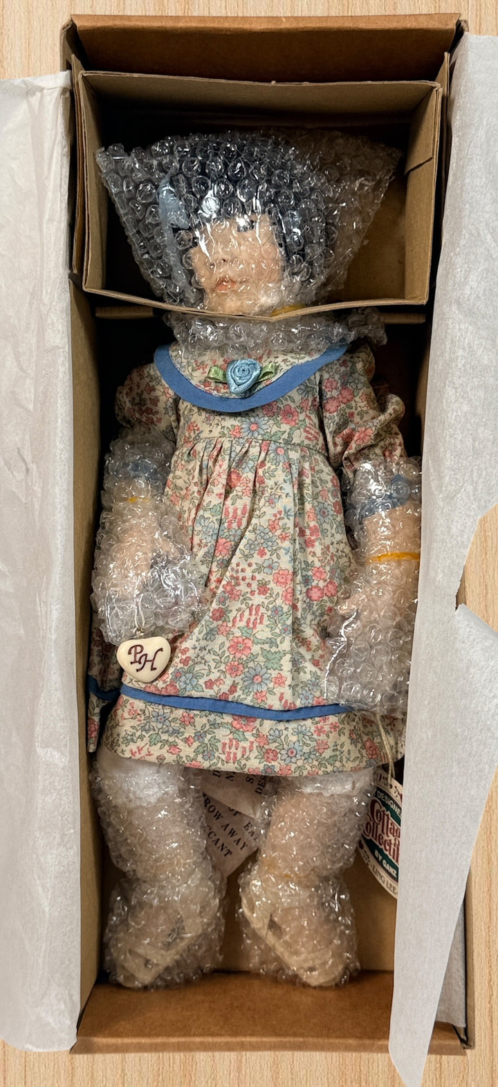 Limited edition Ling Lee porcelain doll by Cottage Collectibles Ganz. Boxed with certificate of authenticity, artist designed collectible in excellent condition.