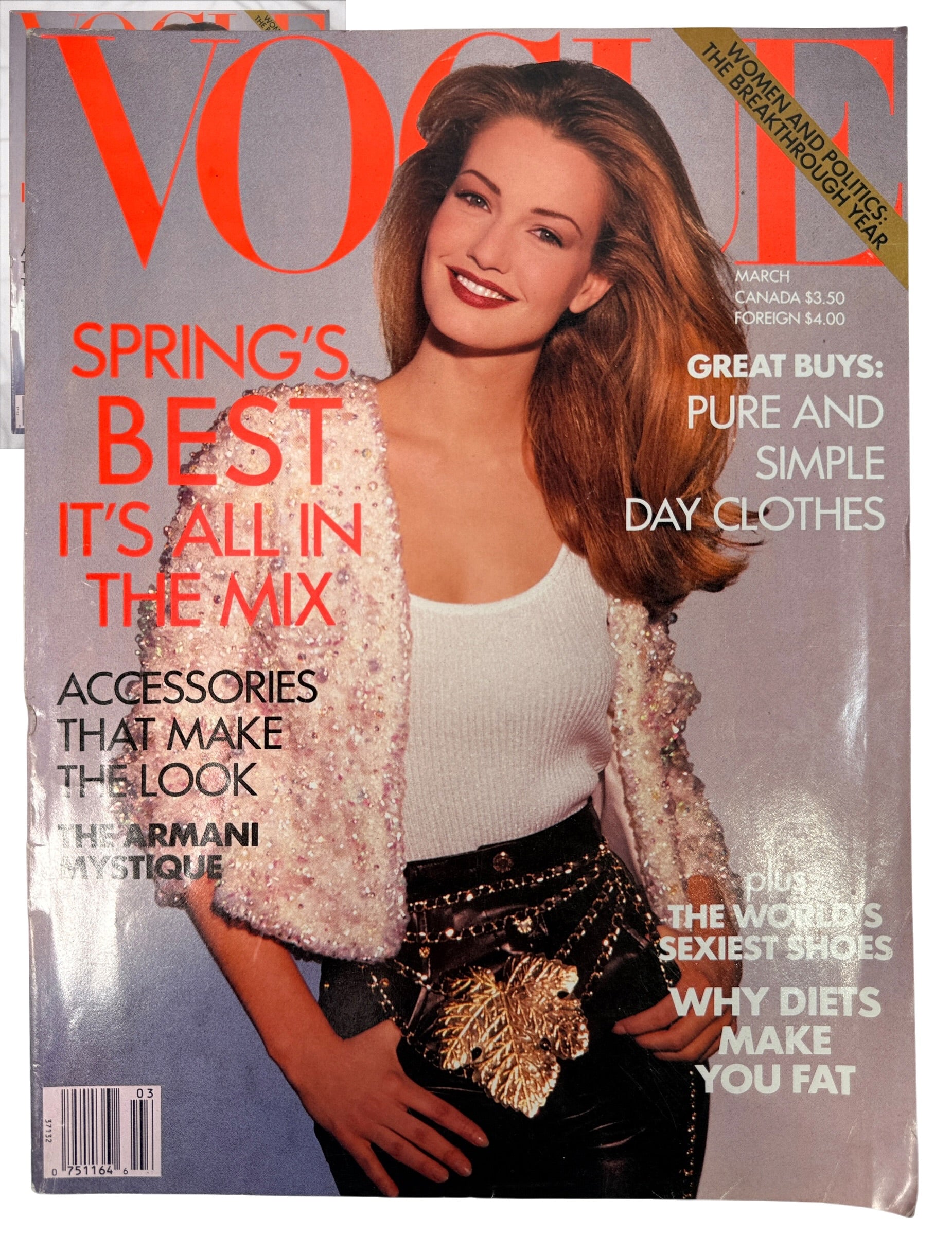Vintage Vogue March 1992 magazine featuring Karen Mulder, with classic 1990s fashion, Cindy Crawford, Giorgio Armani editorials and advertising.