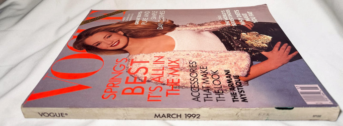 Vintage Vogue March 1992 magazine featuring Karen Mulder, with classic 1990s fashion, Cindy Crawford, Giorgio Armani editorials and advertising.