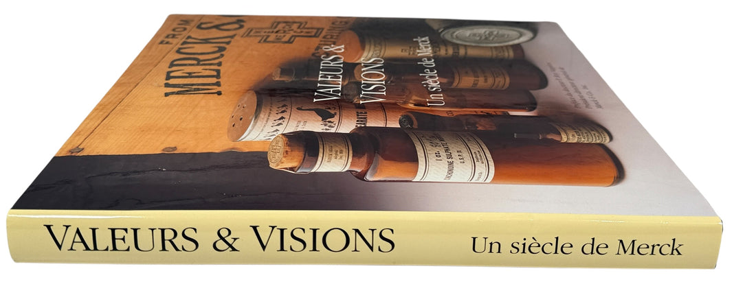 Vintage Merck centennial history book in French featuring archival pharma history photos and corporate memorabilia appeal. Clean collectible hardcover edition.