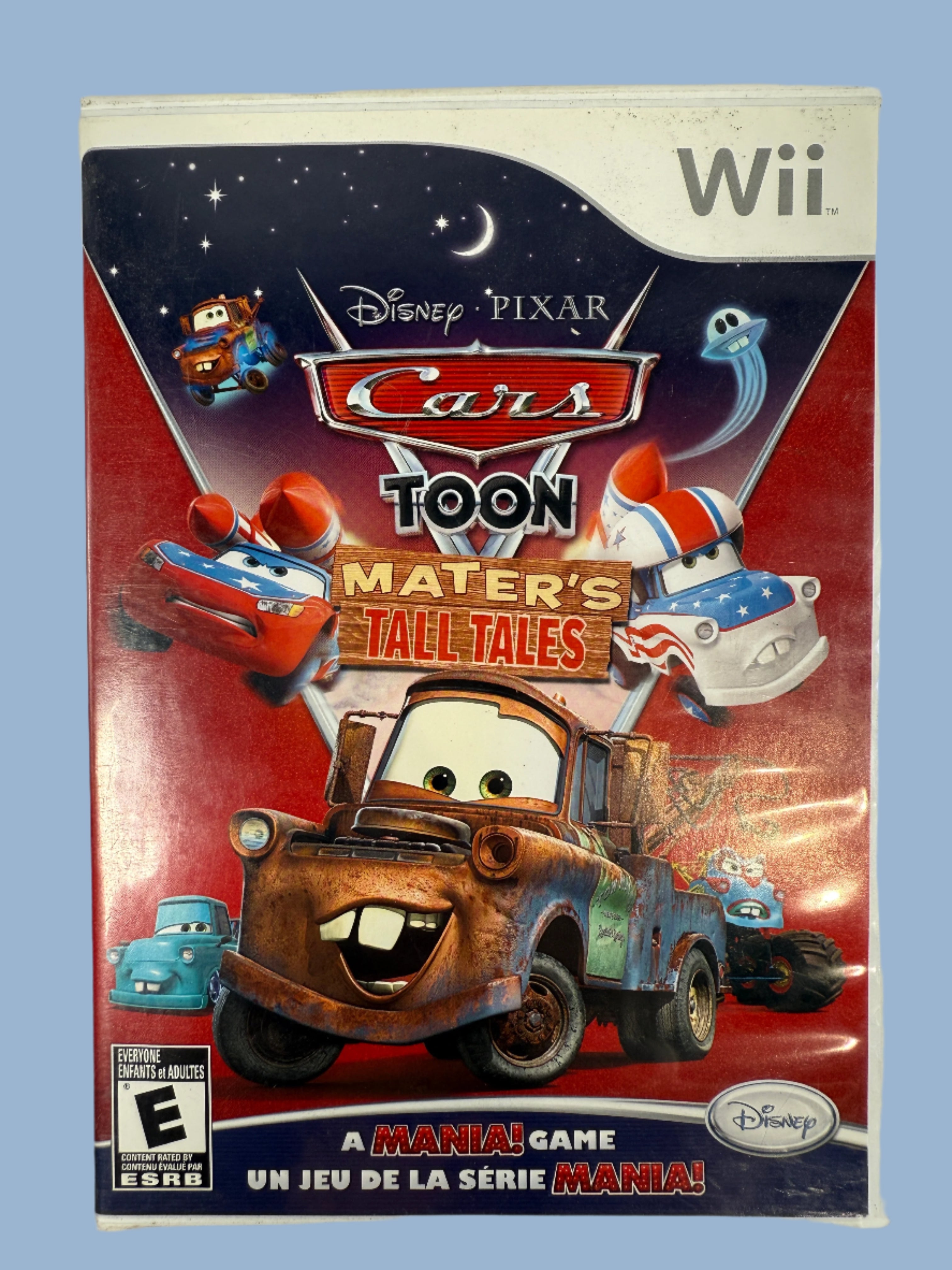 Wii game cartridge for 'Cars Toon: Mater's Tall Tales' by Disney Pixar on a white background