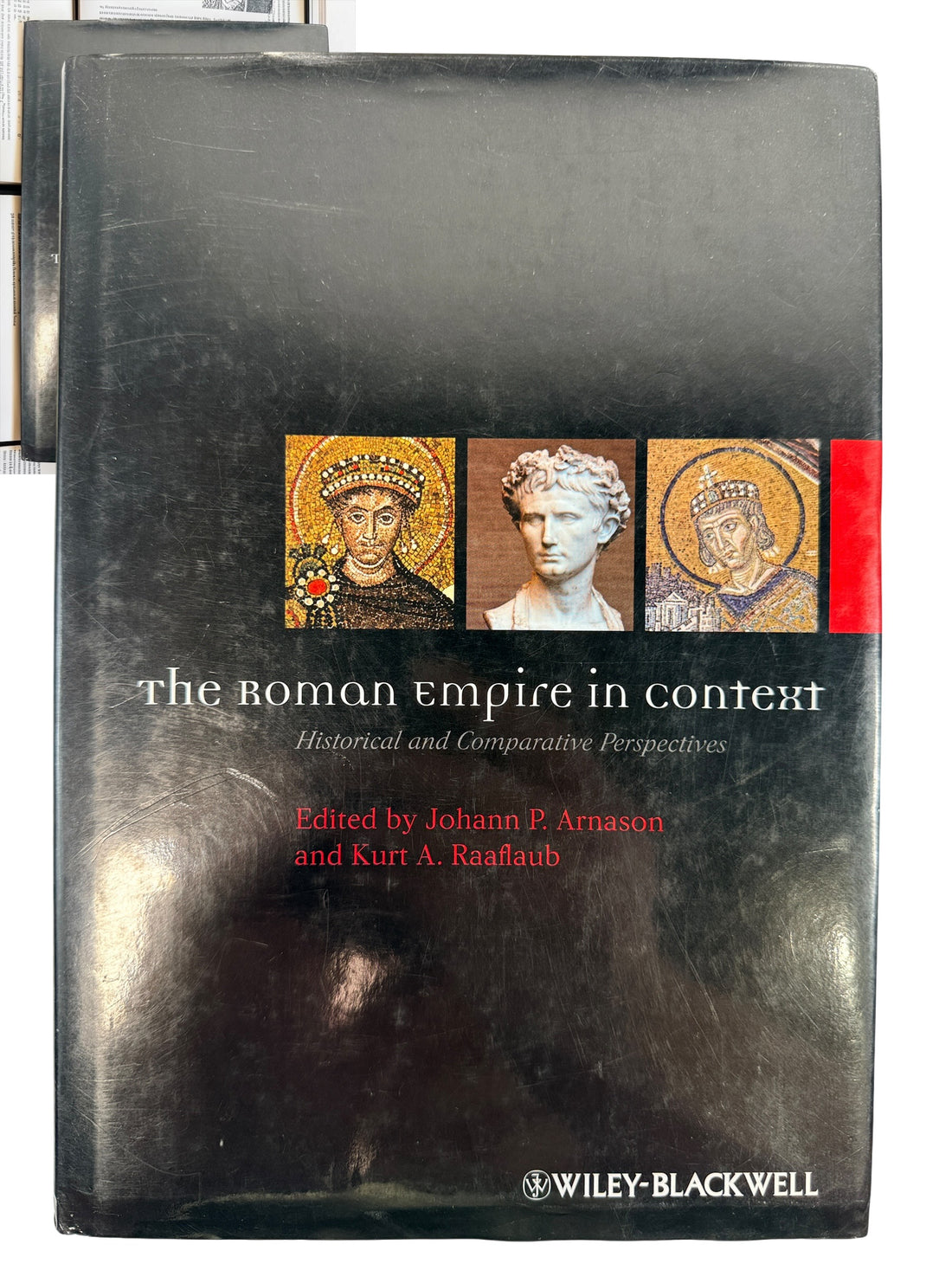2011 first edition The Roman Empire in Context by Arnason &amp; Raaflaub. Wiley-Blackwell hardcover with dust jacket. Academic Roman history reference.