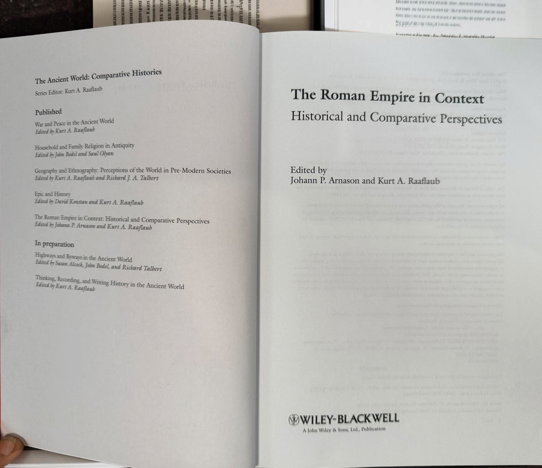 2011 first edition The Roman Empire in Context by Arnason &amp; Raaflaub. Wiley-Blackwell hardcover with dust jacket. Academic Roman history reference.