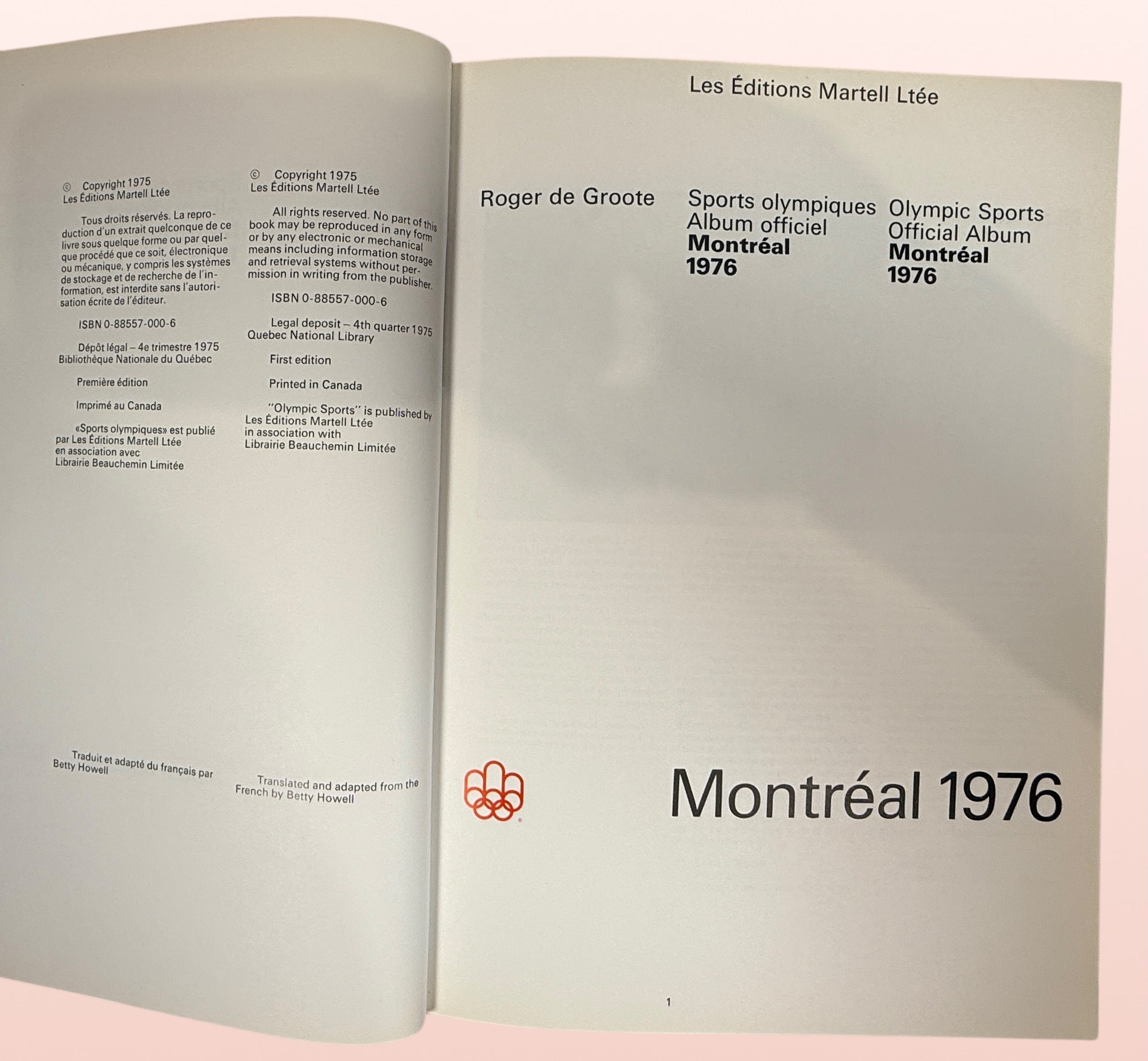 Official 1976 Montreal Olympics hardcover album bilingual Olympic sports reference book vintage Olympic memorabilia collectible Canada Games souvenir.
