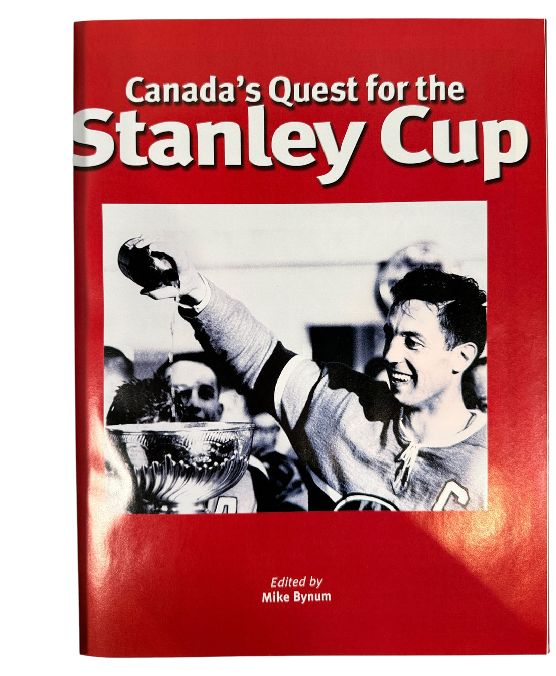 Vintage Stanley Cup hockey history book featuring iconic Canadian teams, archival photos and championship moments. Great sports collectible or gift.