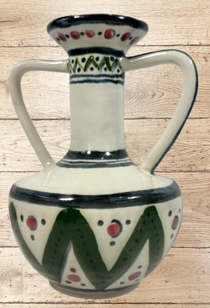 Vintage studio pottery vase signed Line C with double handles, folk art ceramic design in green and red. Decorative handmade collectible pottery piece.