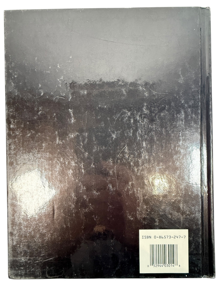 Vintage Singer sewing guide covering overlock and serger techniques. Practical hardcover reference book for garment construction, stitching and sewing projects.