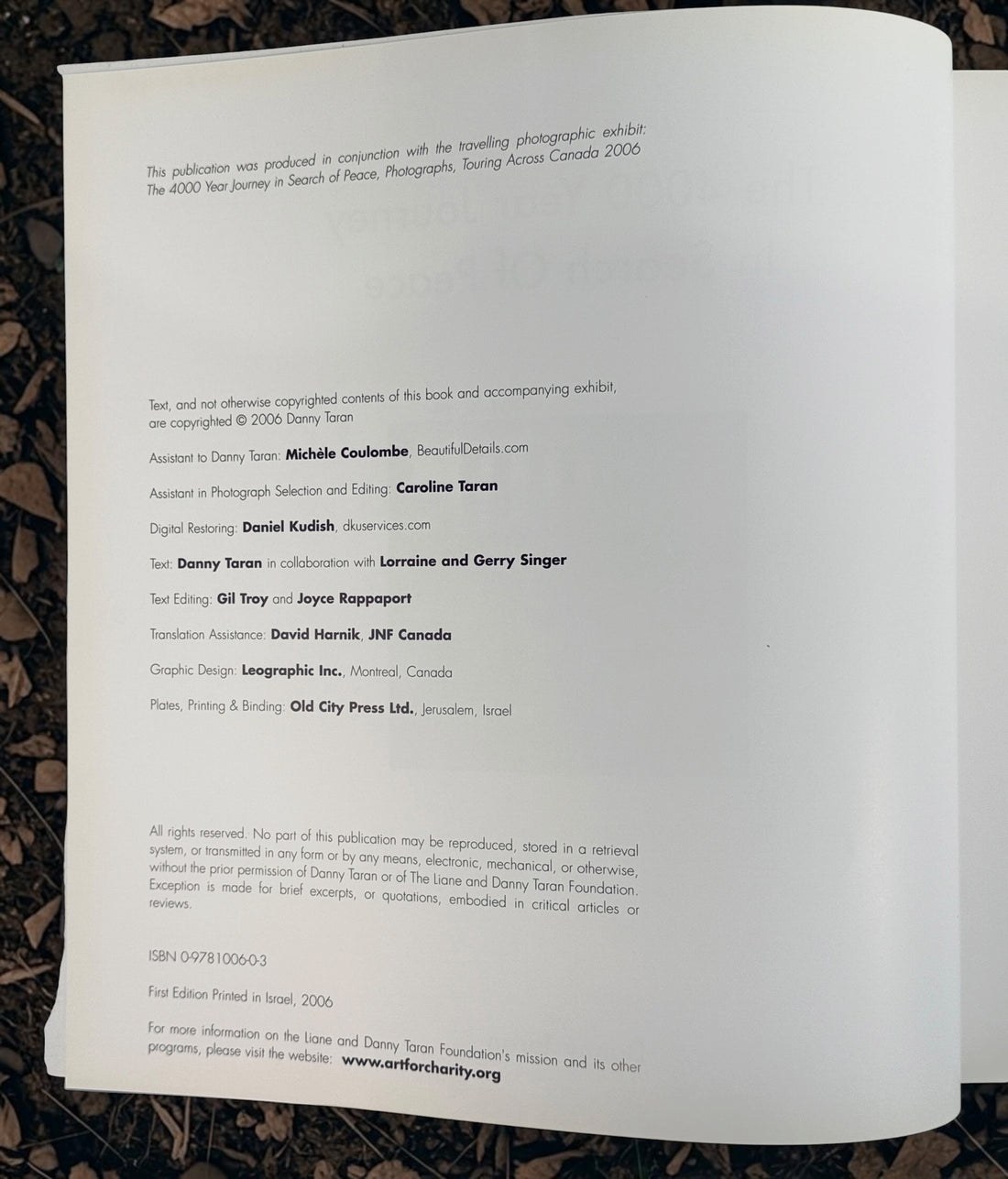 Signed 2006 first edition of Danny Taran’s The 4000 Year Journey: In Search of Peace. Inscribed hardcover exploring Jewish history through photography.