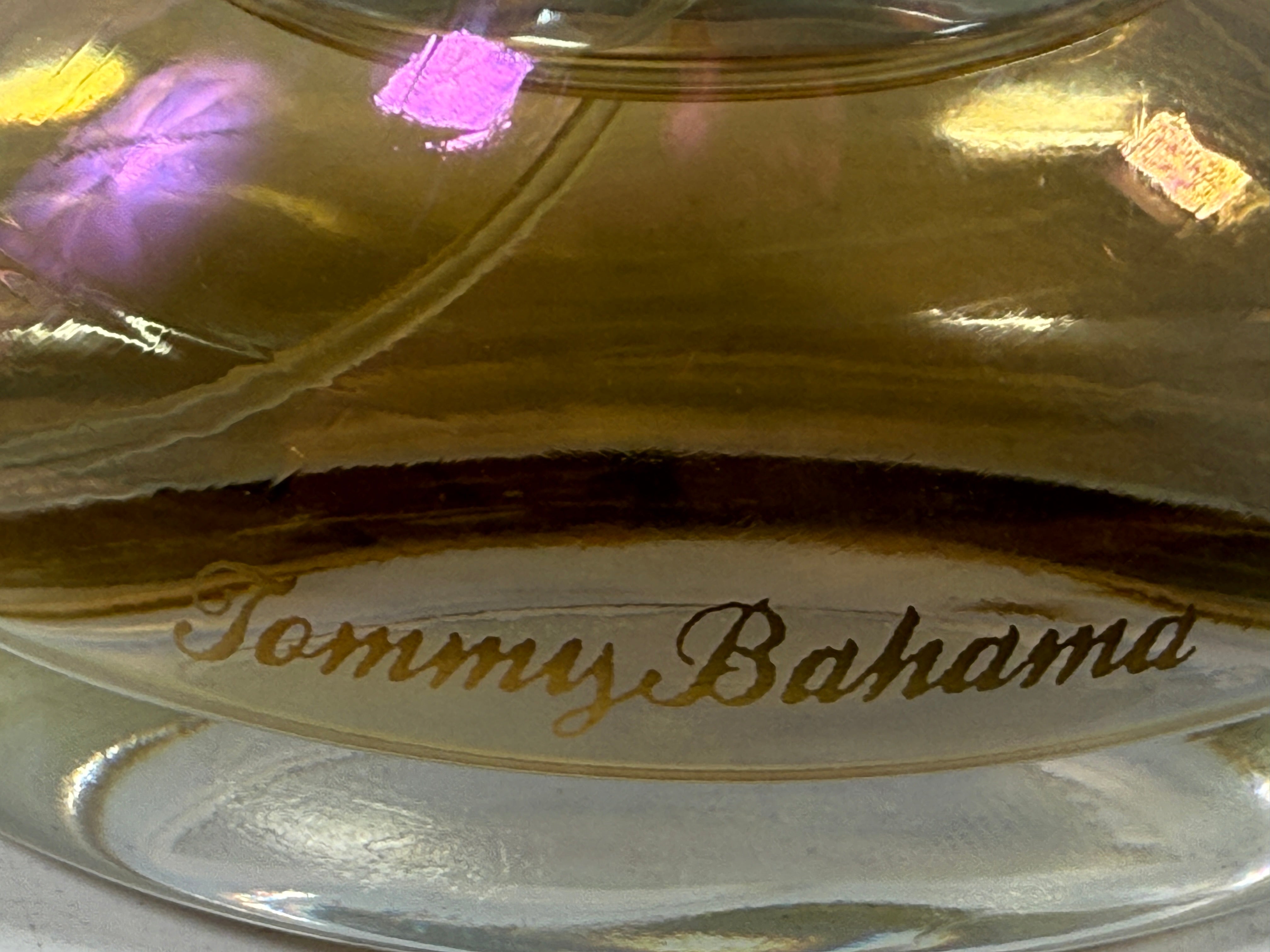Tommy Bahama product with gold and white design