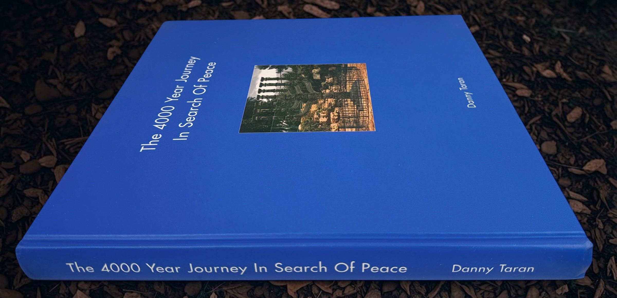 Signed 2006 first edition of Danny Taran’s The 4000 Year Journey: In Search of Peace. Inscribed hardcover exploring Jewish history through photography.