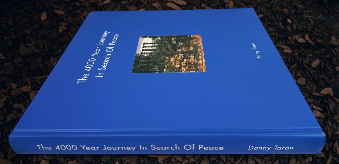 Signed 2006 first edition of Danny Taran’s The 4000 Year Journey: In Search of Peace. Inscribed hardcover exploring Jewish history through photography.