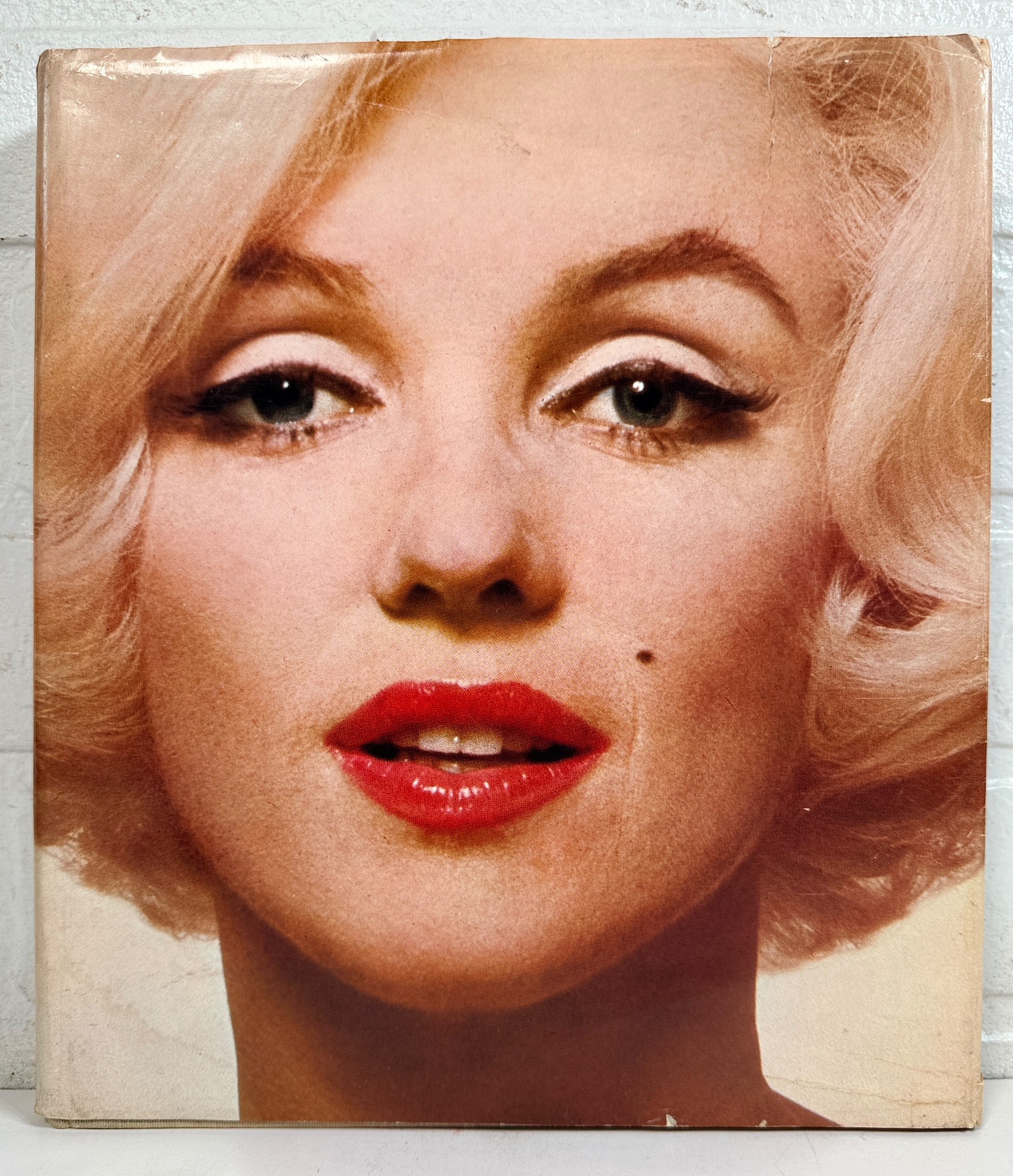 1973 first printing of Norman Mailer’s Marilyn, a large-format Marilyn Monroe hardcover featuring photographs by Avedon, Arnold, Stern, Kirkland and more.