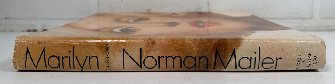1973 first printing of Norman Mailer’s Marilyn, a large-format Marilyn Monroe hardcover featuring photographs by Avedon, Arnold, Stern, Kirkland and more.
