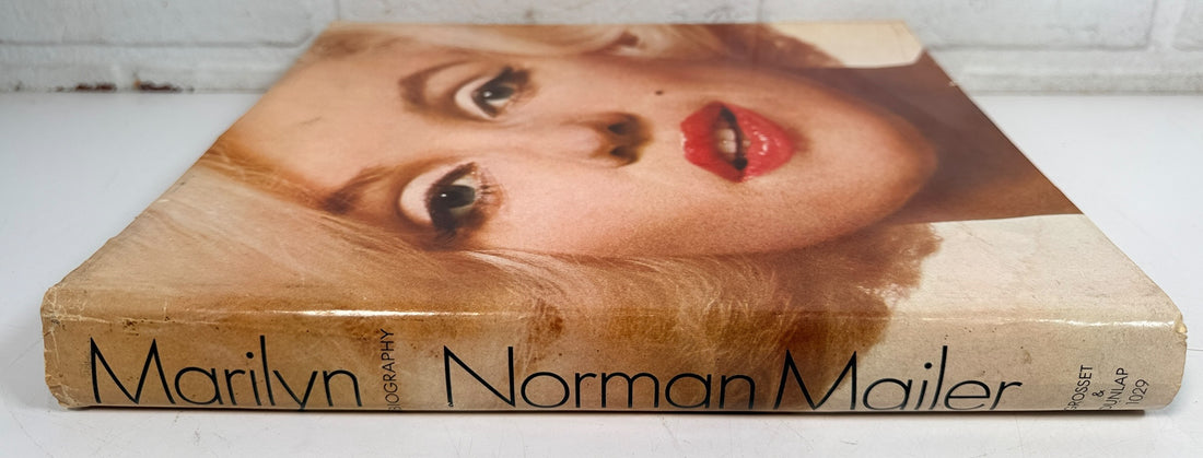 1973 first printing of Norman Mailer’s Marilyn, a large-format Marilyn Monroe hardcover featuring photographs by Avedon, Arnold, Stern, Kirkland and more.