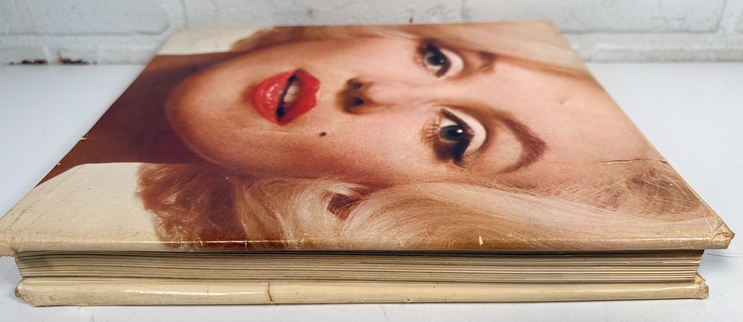 1973 first printing of Norman Mailer’s Marilyn, a large-format Marilyn Monroe hardcover featuring photographs by Avedon, Arnold, Stern, Kirkland and more.