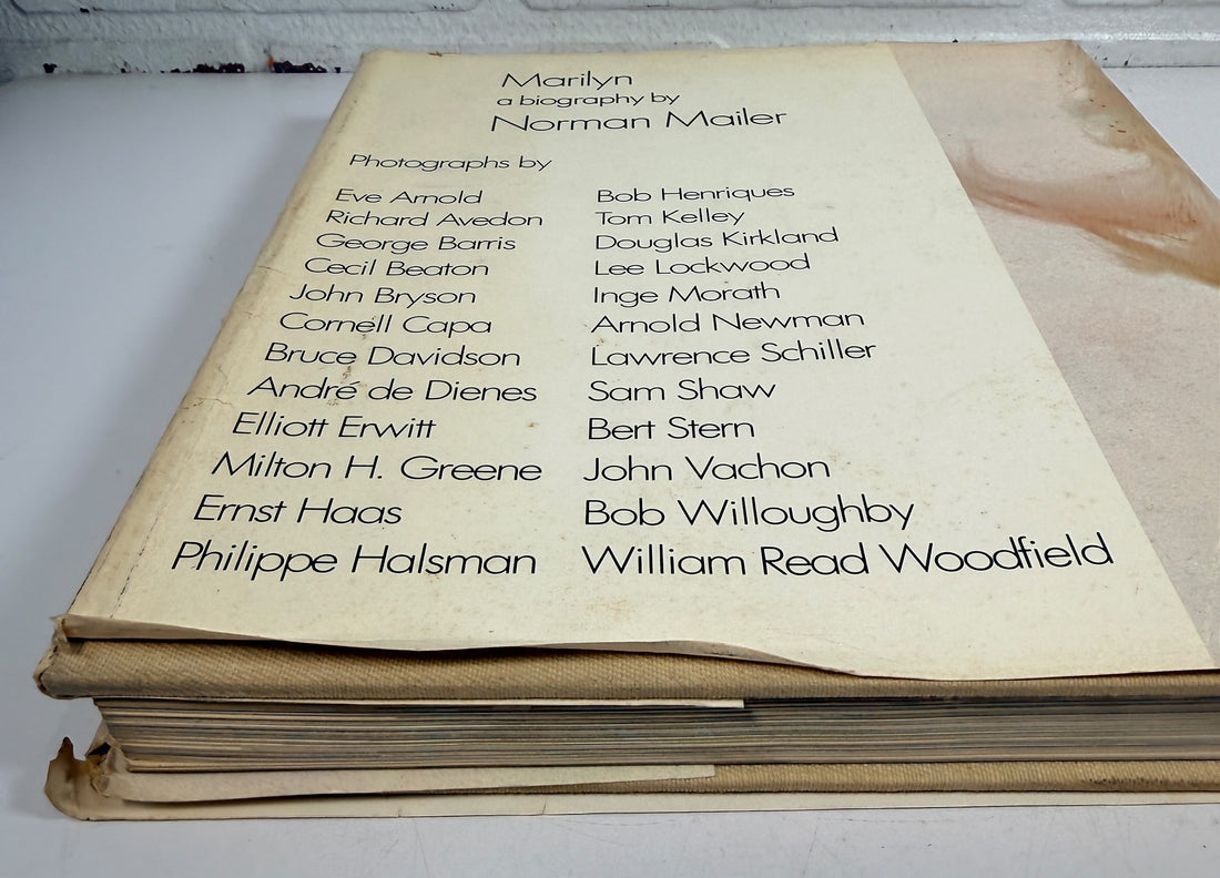 1973 first printing of Norman Mailer’s Marilyn, a large-format Marilyn Monroe hardcover featuring photographs by Avedon, Arnold, Stern, Kirkland and more.