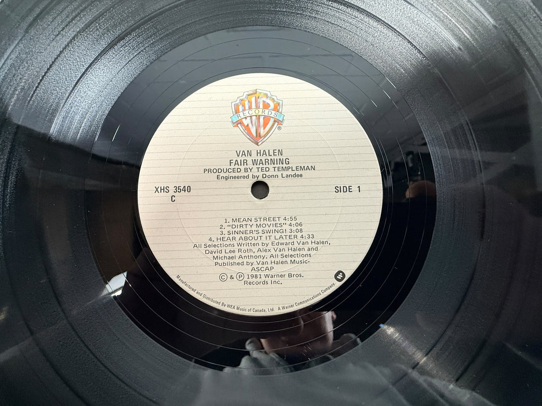 1981 Van Halen Fair Warning LP Canadian pressing. Classic hard rock vinyl with original inner sleeve, collectible album priced for value and quick sale.