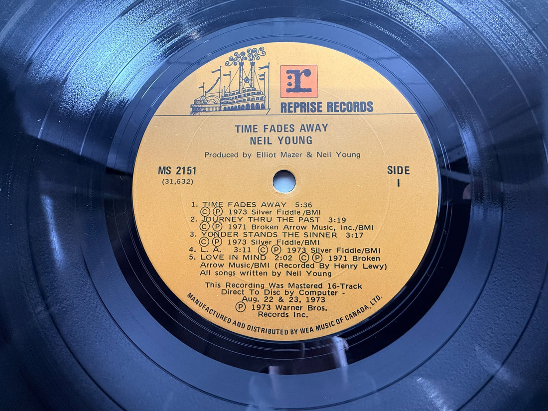 Original 1973 Neil Young Time Fades Away LP Canadian pressing with insert. Classic live-era vinyl album in VG condition, collectible Reprise Records issue.
