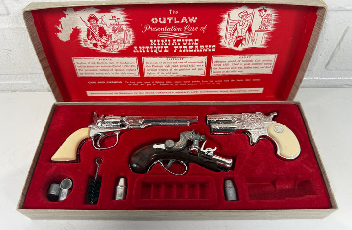 Vintage B.C.M. “Outlaw” Miniature Antique Firearms Set – Made in England – 3 Pistols – Partial Accessories