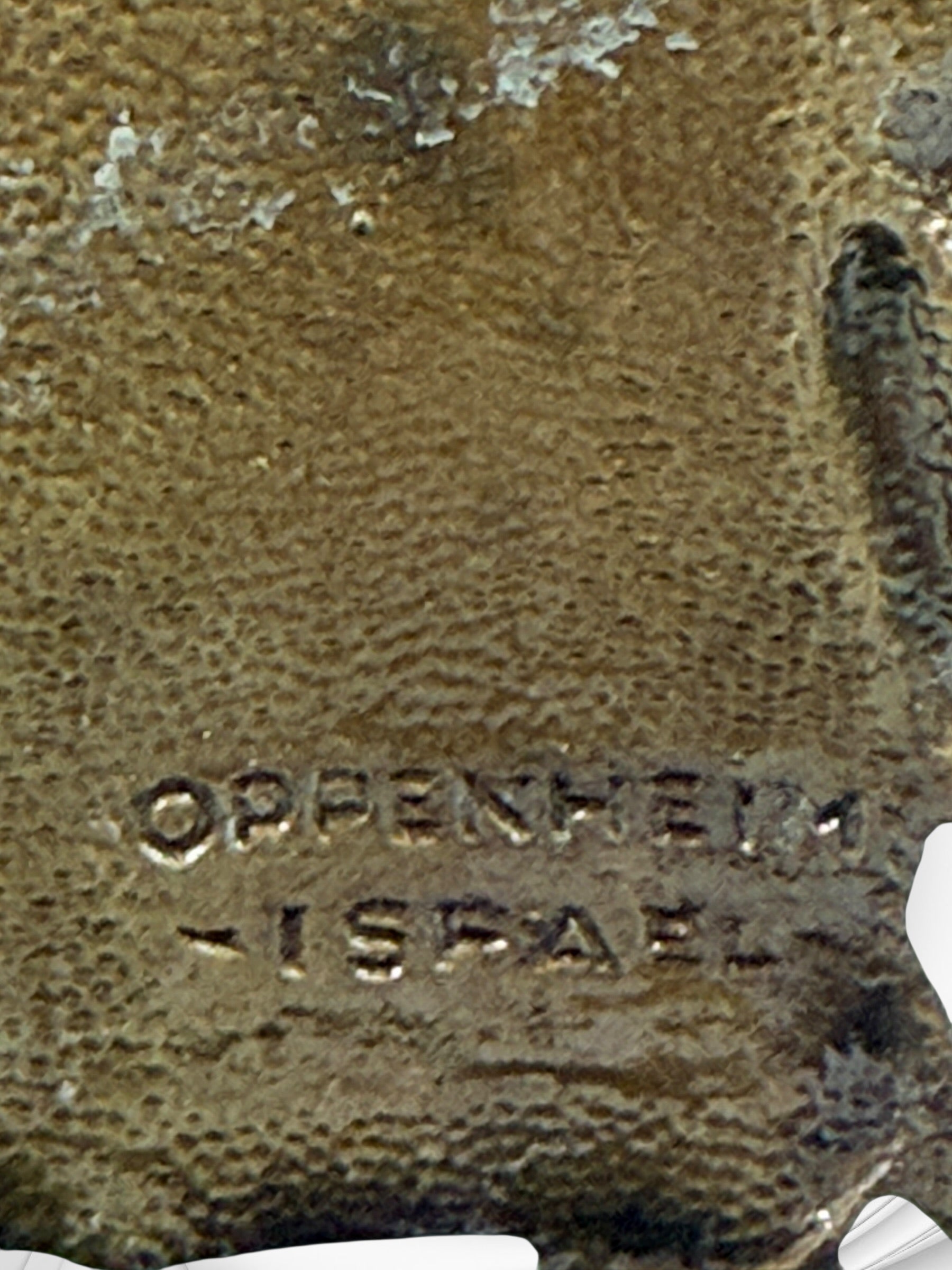 Vintage brass Judaica bookends from Israel with Ten Commandments tablets and lions. Solid decorative pair with classic religious symbolism and display appeal.